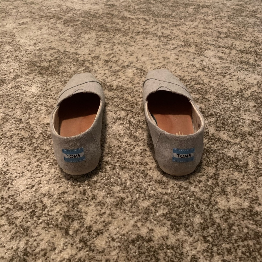 Women’s gray name brand Toms, size: 6